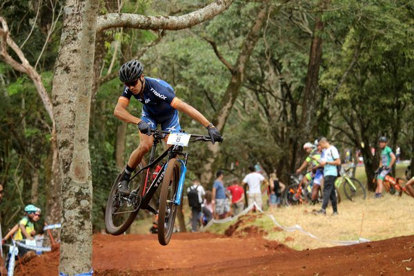 How do UK sports clubs foster community and inclusivity?